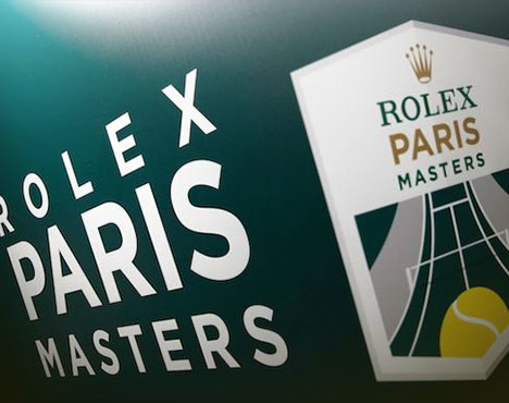 Логотип турнира Rolex Paris Masters, включающий текст, теннисный мяч, силуэт корта и фирменный знак Rolex. Дизайн выполнен в зеленой и белой цветовой гамме